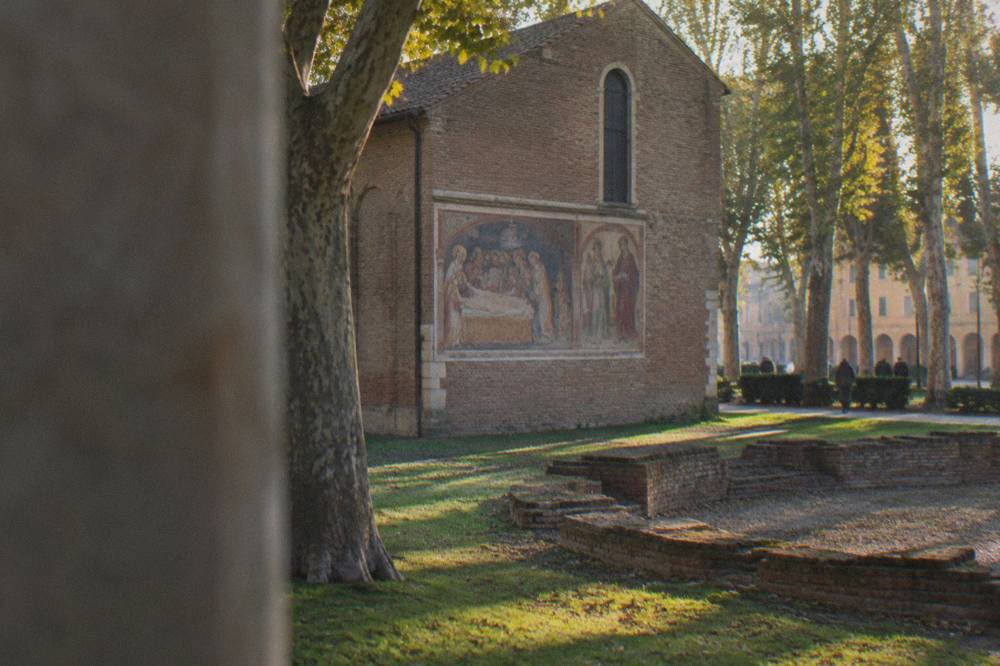A framed fresco panel of a narrative scene on the side wall of the Scrovegni Chapel