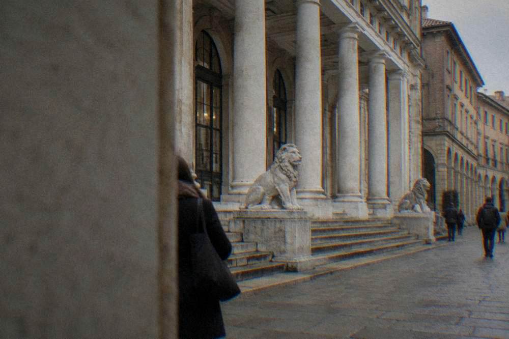 Neoclassical cafe facade with columns and a broad stair