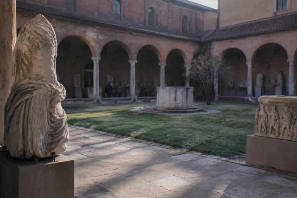 Roman stone artifacts and sculpture displayed in the archaeology galleries of the Musei Civici Eremitani
