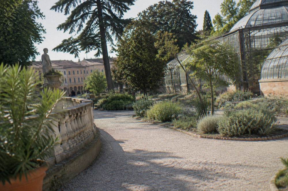 Labelled beds of herbs arranged in a geometric pattern inside a walled renaissance garden