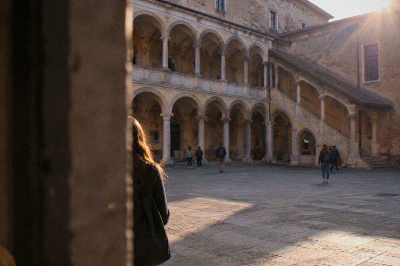 The courtyard of Palazzo Bo in Padua with its arcades and historic university walls