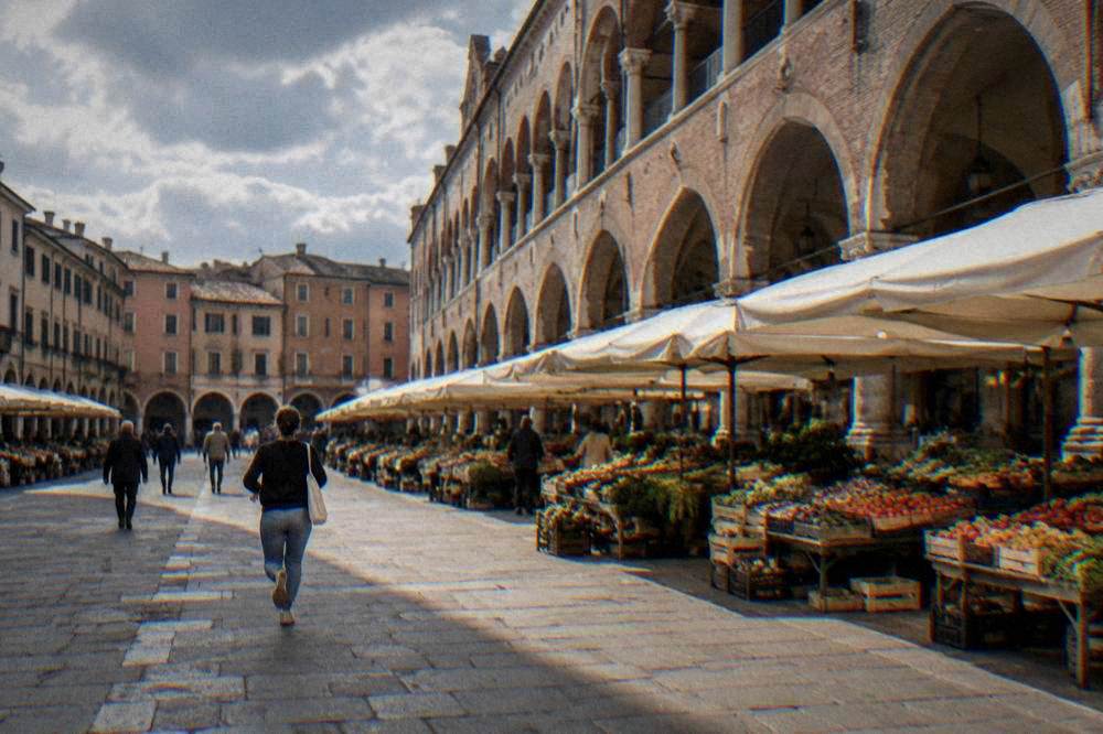 Open market square under the long wall of a medieval hall