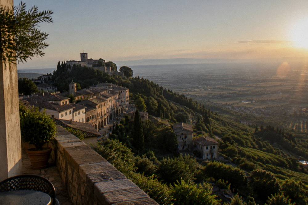 A panoramic view over the Veneto plain from a hilltop terrace on a clear day