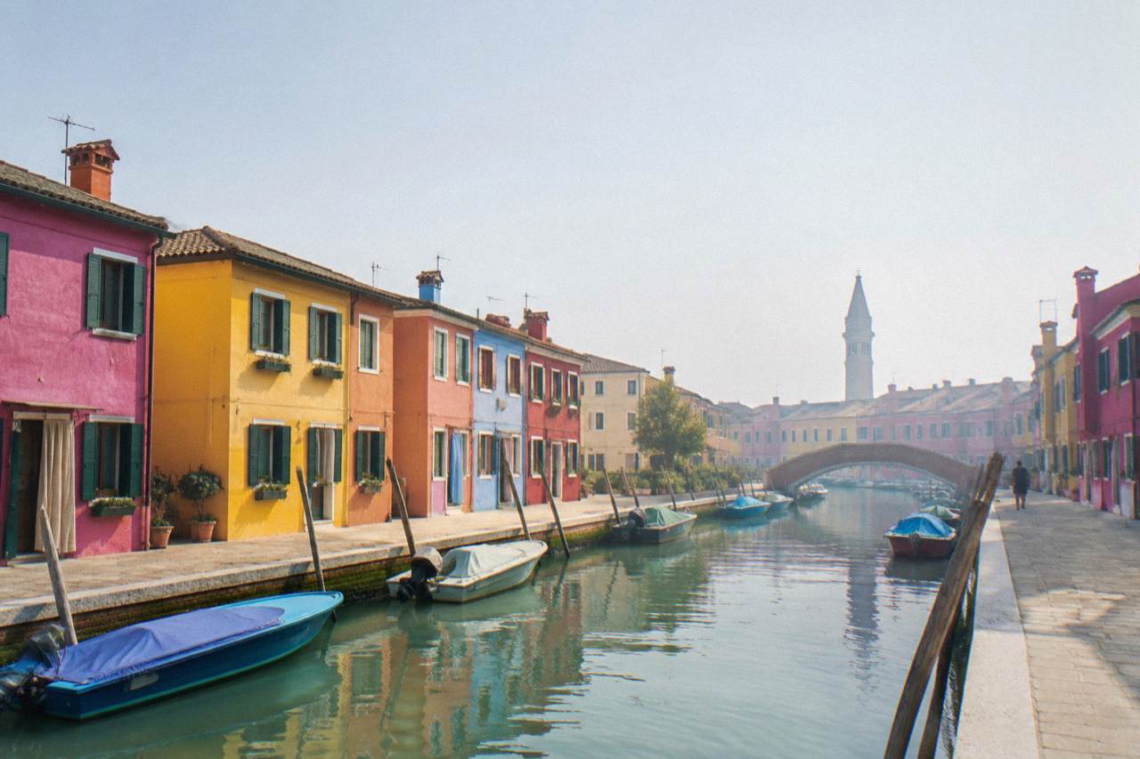 Colourful painted houses along a canal on the island of Burano in the Venice lagoon