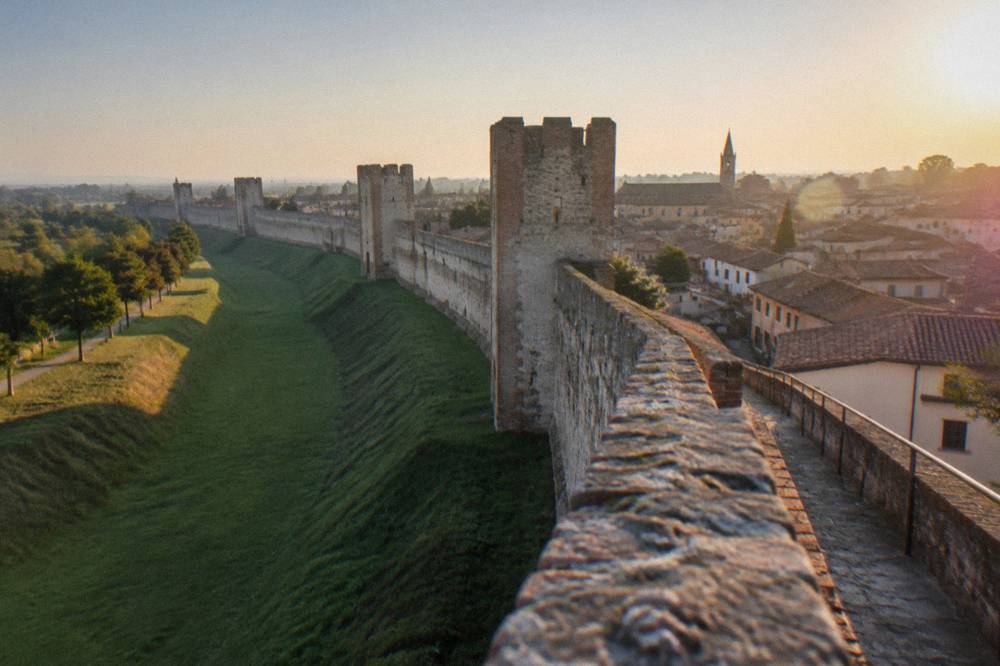 View along the top of Montagnana's walls with the town rooftops on one side