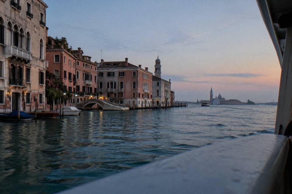 The open lagoon around Venice seen from a vaporetto with distant bell towers on the horizon