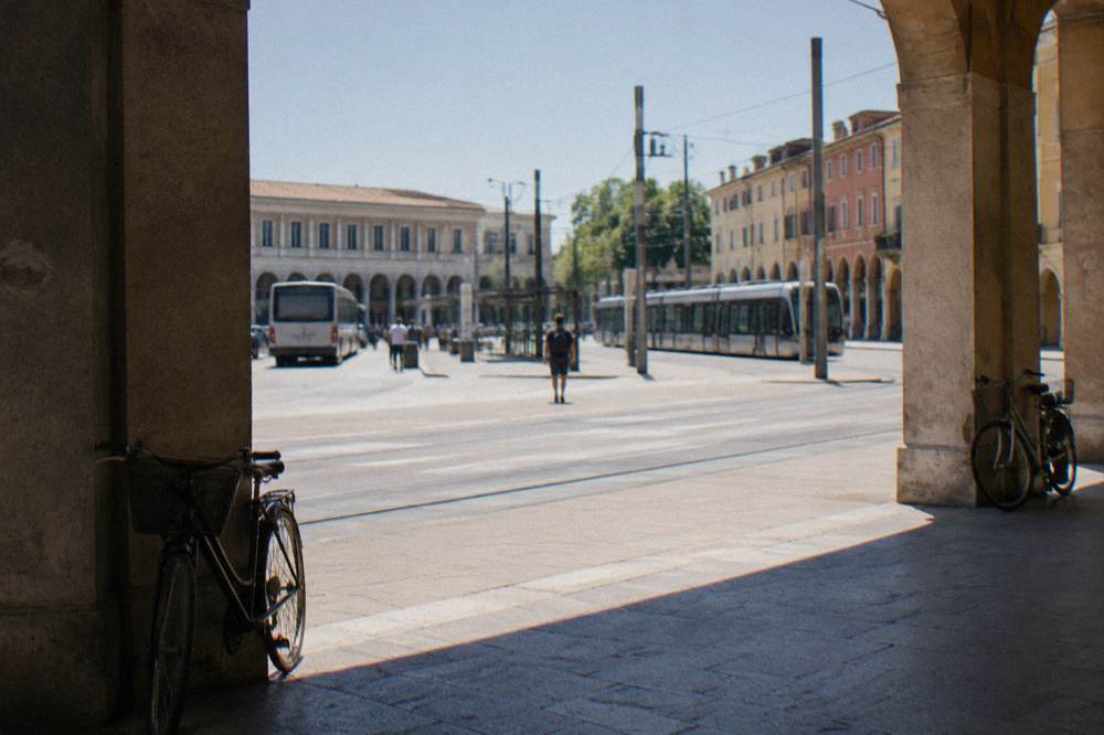 The forecourt of Padua railway station with buses and the tram track