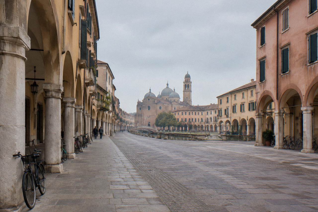 Arcaded street in central Padua with a level paved walkway under the porticoes