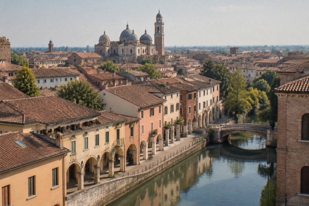 Padua rooftops seen from a tower with the Venetian plain on the horizon
