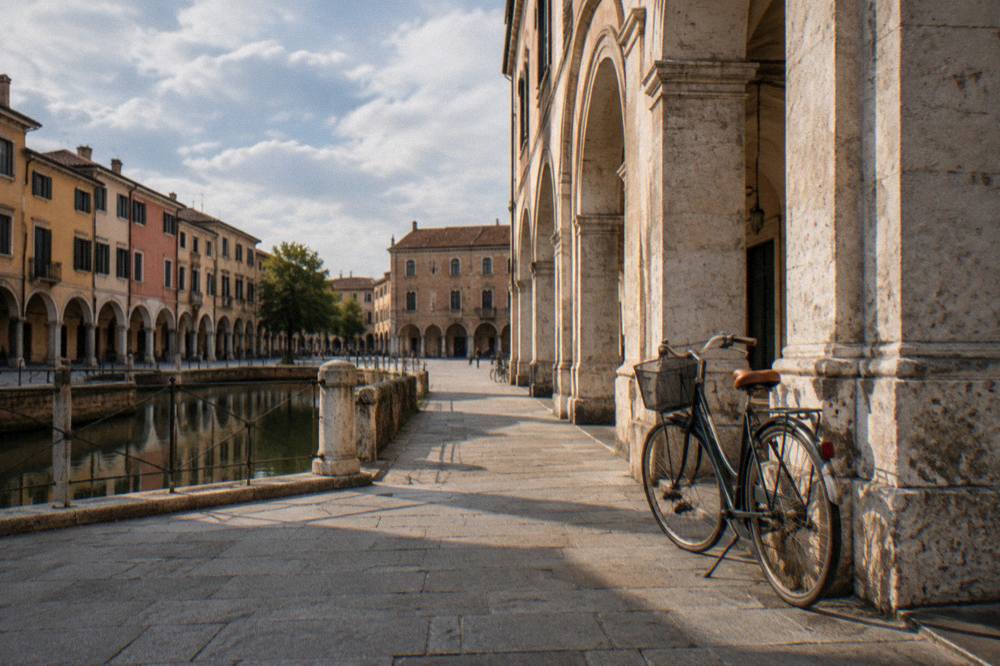 A bicycle parked outside a university building in Padua