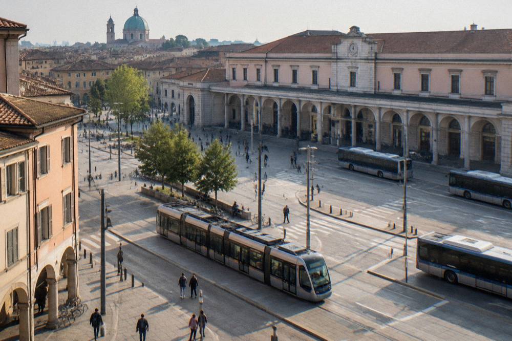 The forecourt of Padua railway station with buses and a tram passing
