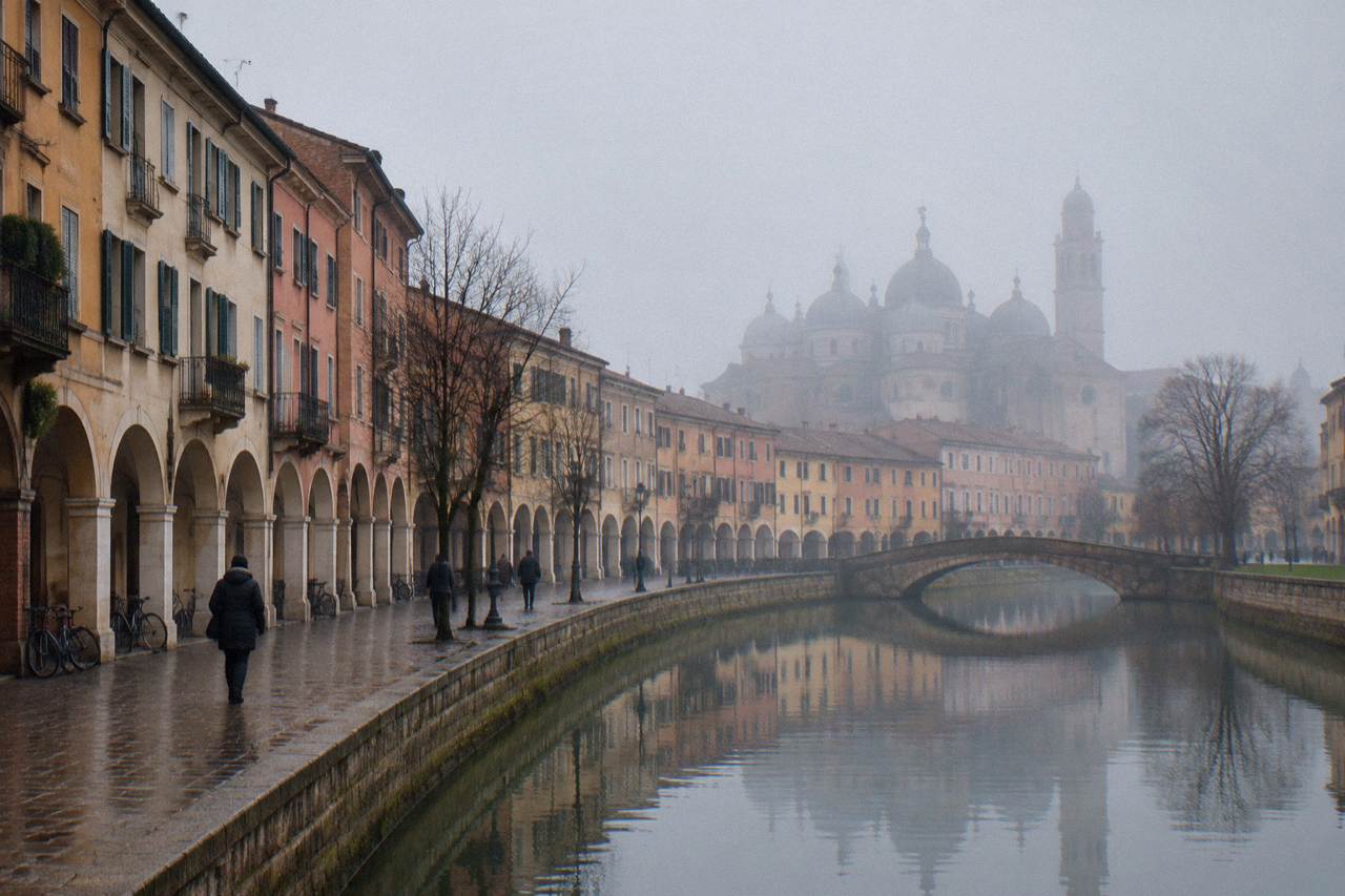 Fog resting over the rooftops and domes of Padua on a cold winter morning