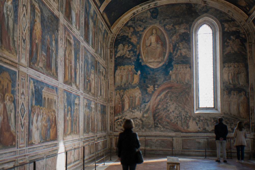 Interior of the Scrovegni Chapel with Giotto frescoes in blue and gold