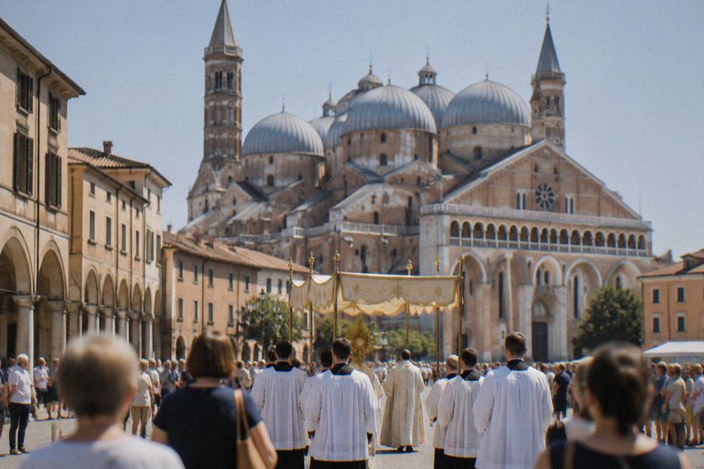 A religious procession moving through a sunlit Italian square with onlookers