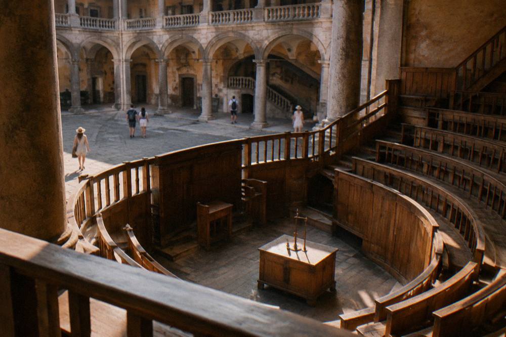 Old anatomical theatre with tiered wooden galleries ringing a small central floor