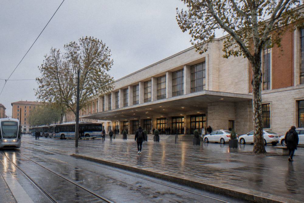 The forecourt and entrance of Padova railway station with buses and trams