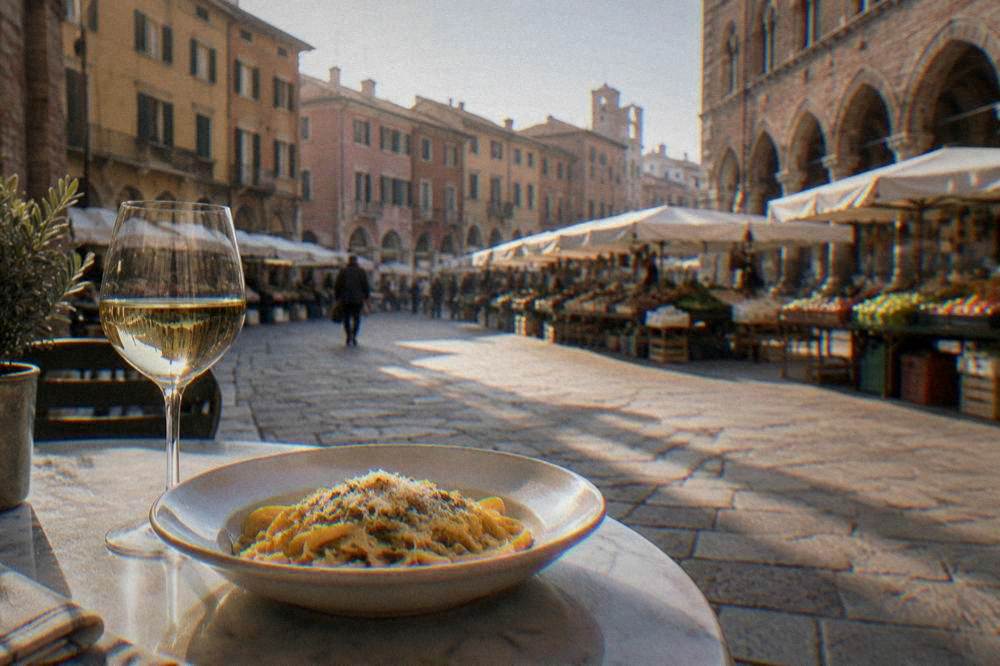 Plate of regional pasta on a plain table, no labels