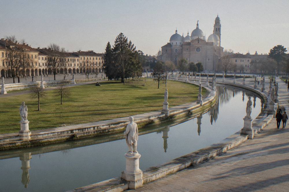 Prato della Valle in Padua with its oval canal and ring of statues