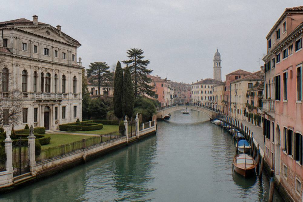 Palladian villa facade with lawns along the Brenta canal