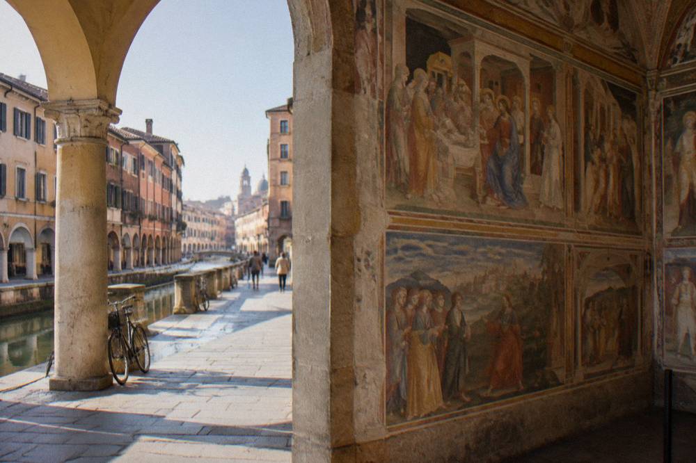 Renaissance frescoed interior wall with narrative scenes in a Padua chapel